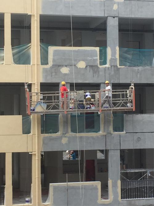 守护校园之美_我校教学楼外墙维修工程侧记